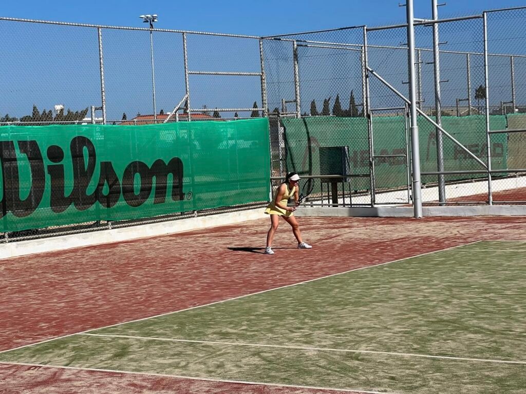 “Victoria Lacki, the 15-year-old Swedish tennis prodigy, training at Helsingborgs Tennisklubb with full concentration and power ahead of her next international tournaments.”