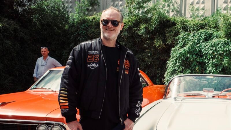 Maximillion Cooper in Istanbul with Gumball 3000 hypercars at the Cars on Sundays event, joined by Ferrari, Mercedes, and Lamborghini supercars.